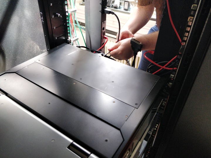 Unplugging VGA cables from the rack console